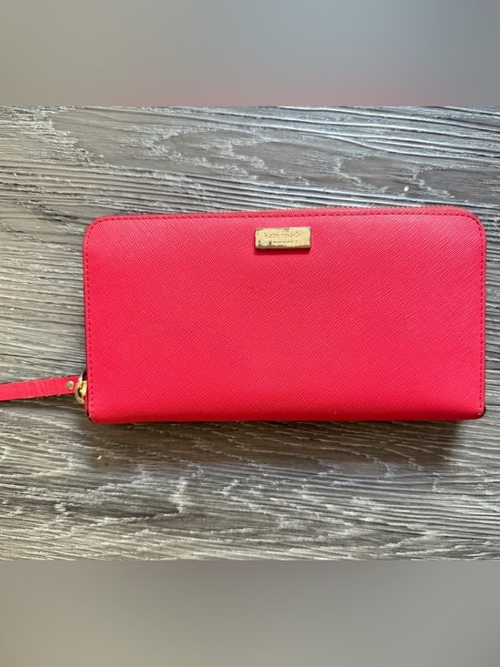 kate spade Handbags - kate spade bright red zip-around Saffiano leather wallet with gold plaque